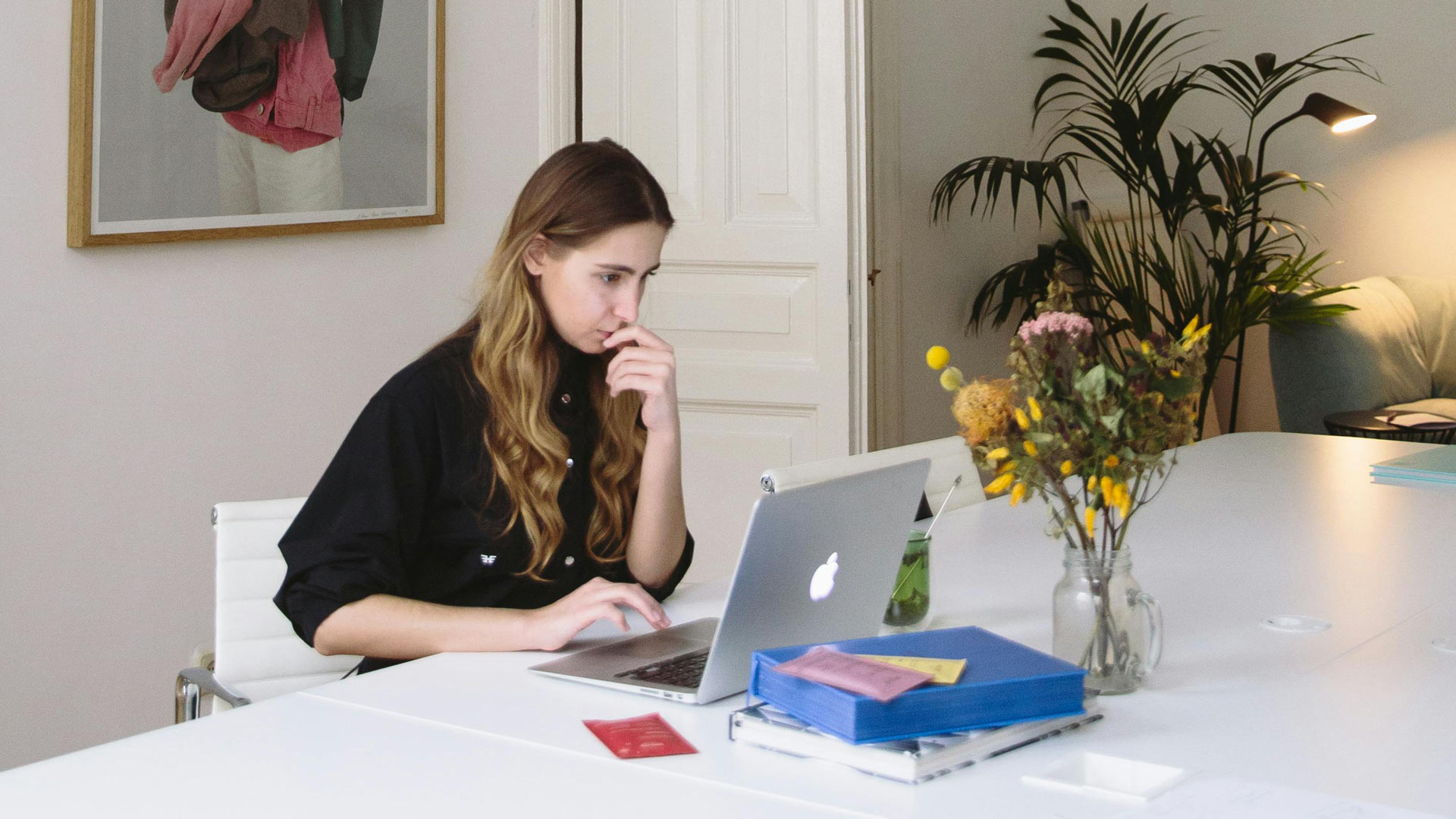 Young woman sitting at a computer